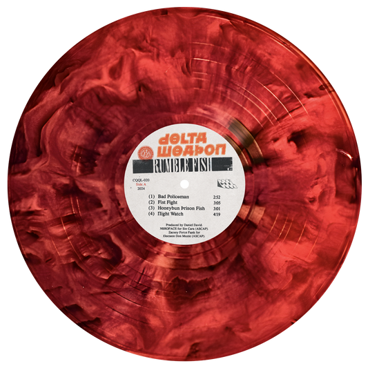 Red vinyl record with a label featuring text and a barcode on a white background