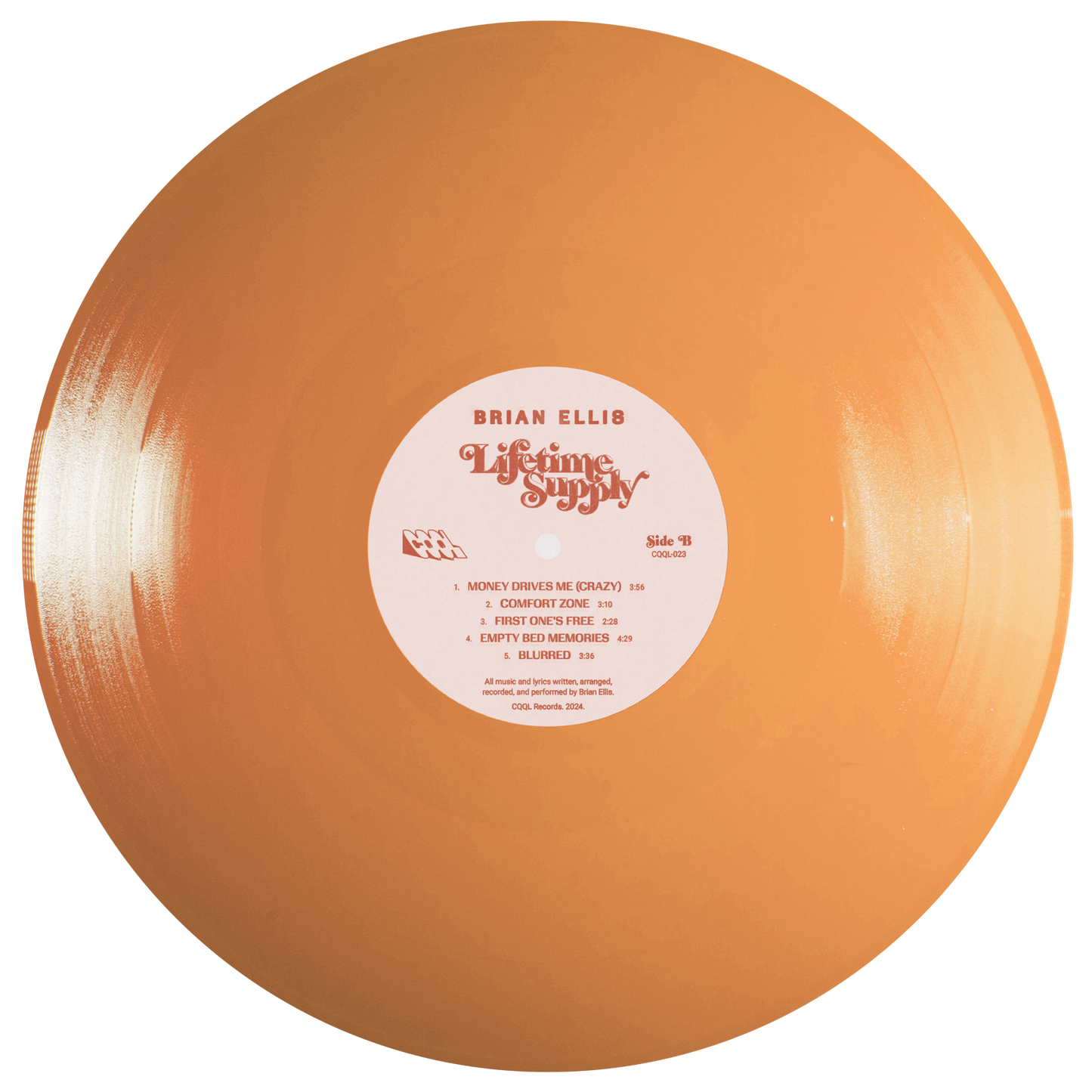 Peach-colored vinyl record with a label on a white background