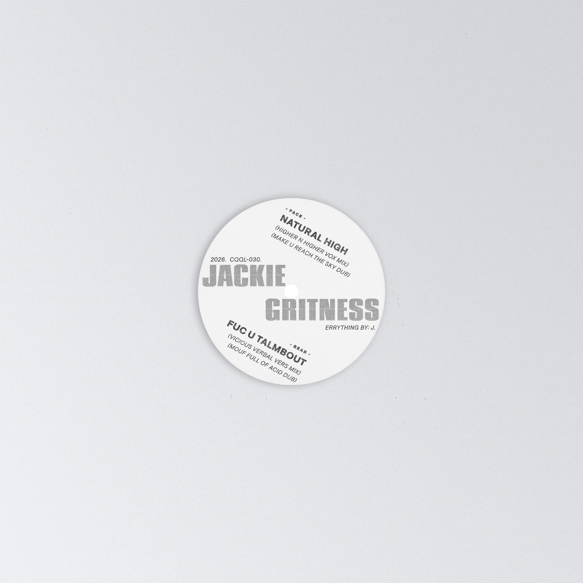 Round white sticker with text on a light gray background