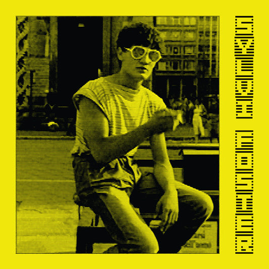Person sitting on a bench with a yellow border and text on a black and white photo.